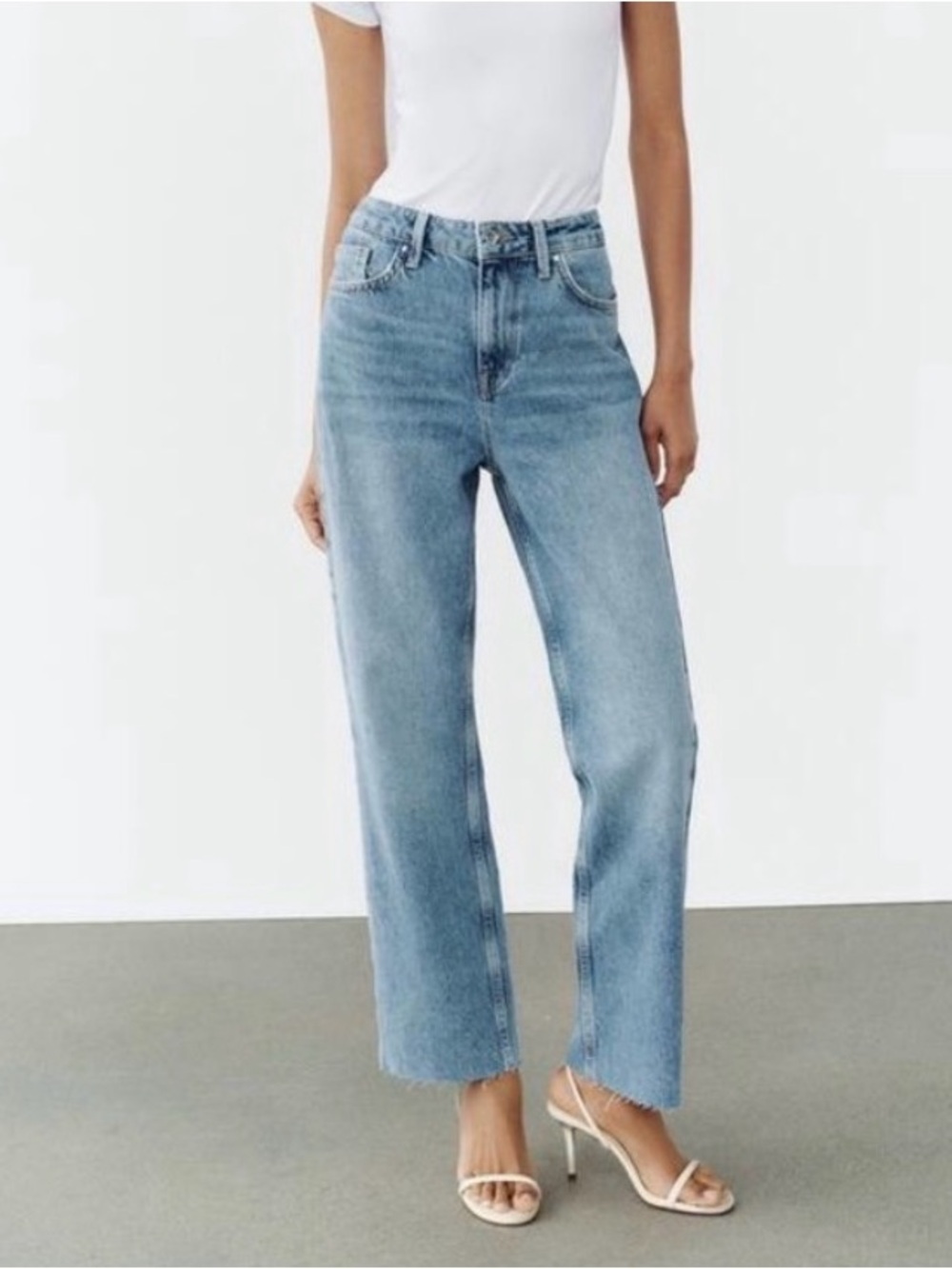 Zara Light Wash Blue High-Rise Straight Leg Jeans with distressed hem